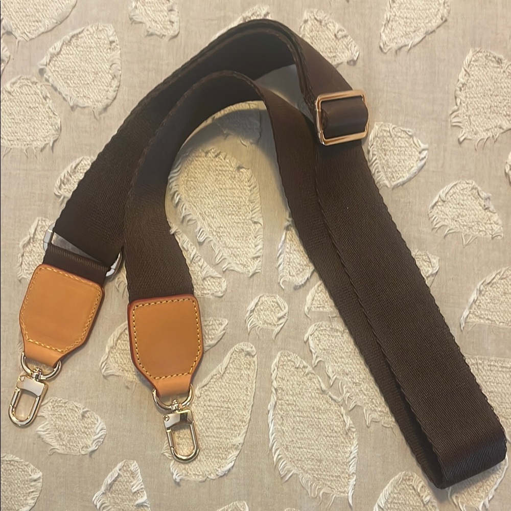 Louis Vuitton Brown and tan leather bag strap. Matches perfectly w/ authentic